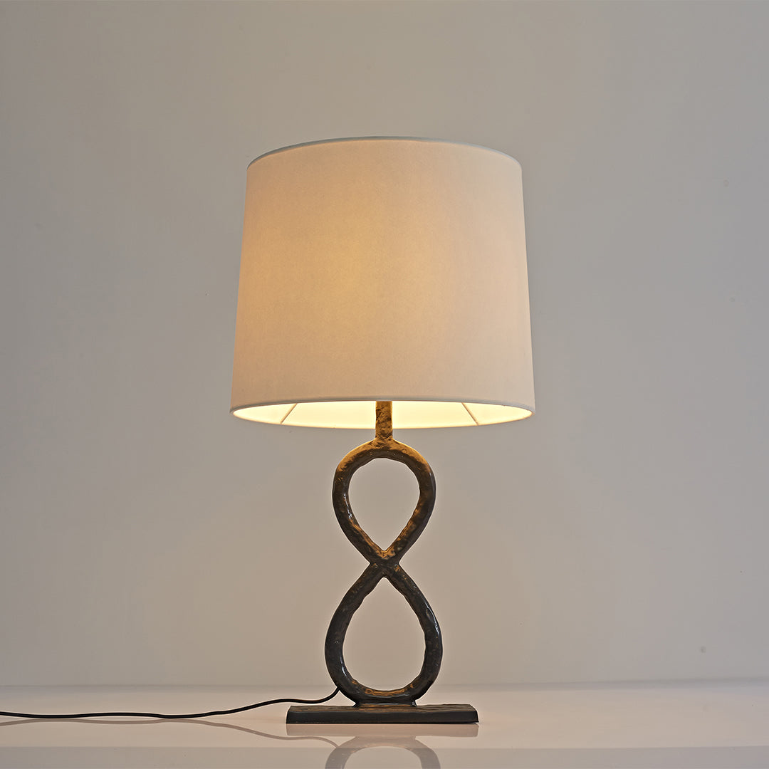 Bronze Metal Table Lamp - European Luxury Fabric Light

Enhance your home decor with this stunning bronze metal table lamp, featuring exquisite European luxury fabric. Perfect for living rooms, bedrooms, or office spaces, this elegant light fixture adds s
