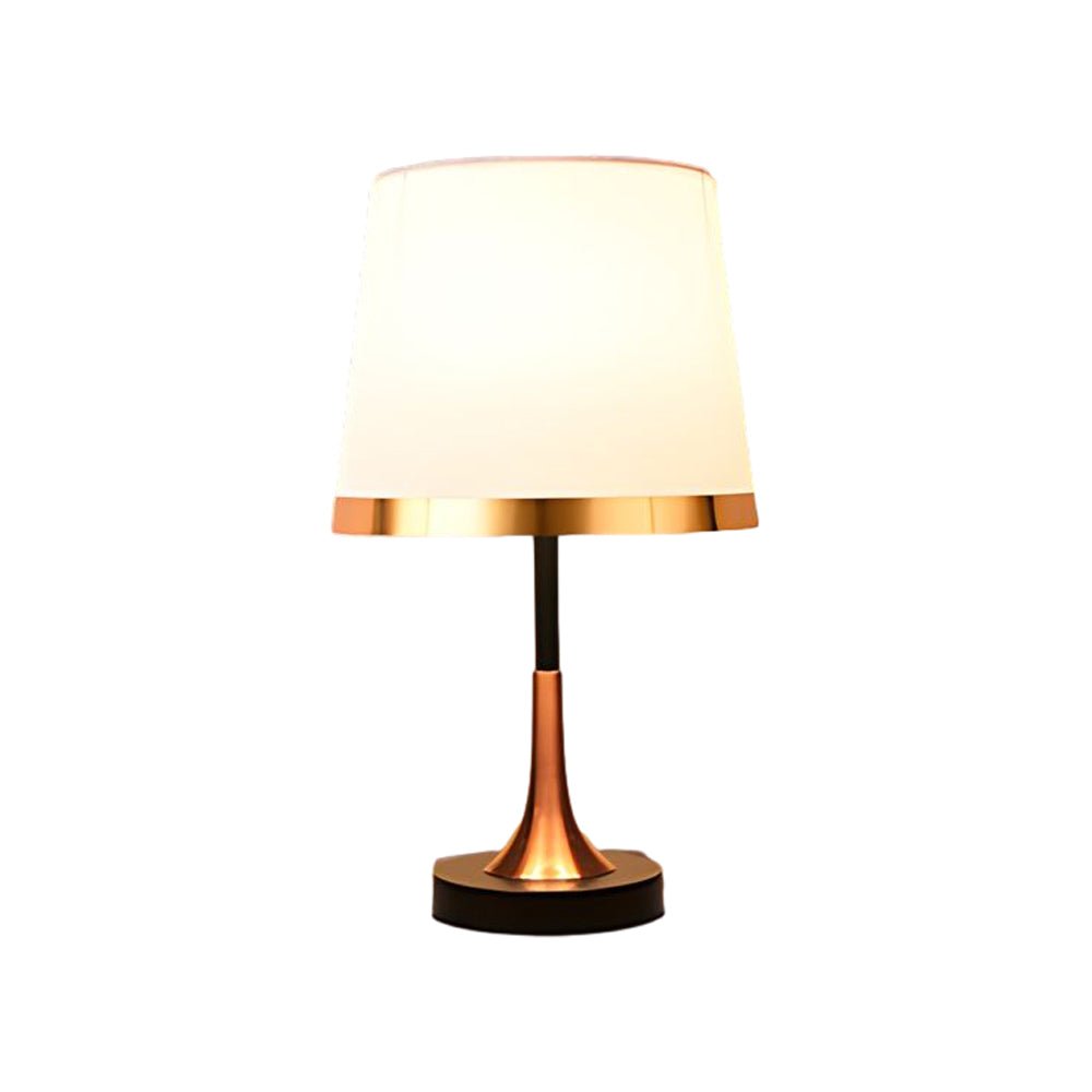 Gold White Modern Table Lamp - Iron and Fabric Design 

Illuminate your space with this stylish gold and white table lamp. Crafted from durable iron and soft fabric, this modern lamp complements any decor. Ideal for bedrooms, living rooms, or office space