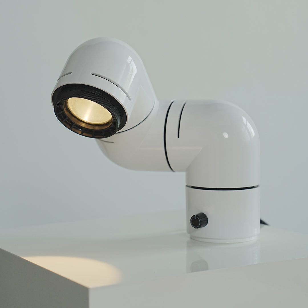 **Statement Table Lamp - Creative Pipe Modern Rotating Design**

**Product Description:**
Introducing our Statement Table Lamp, a unique blend of creativity and modern design. This eye-catching lamp features a striking pipe-inspired structure that not onl